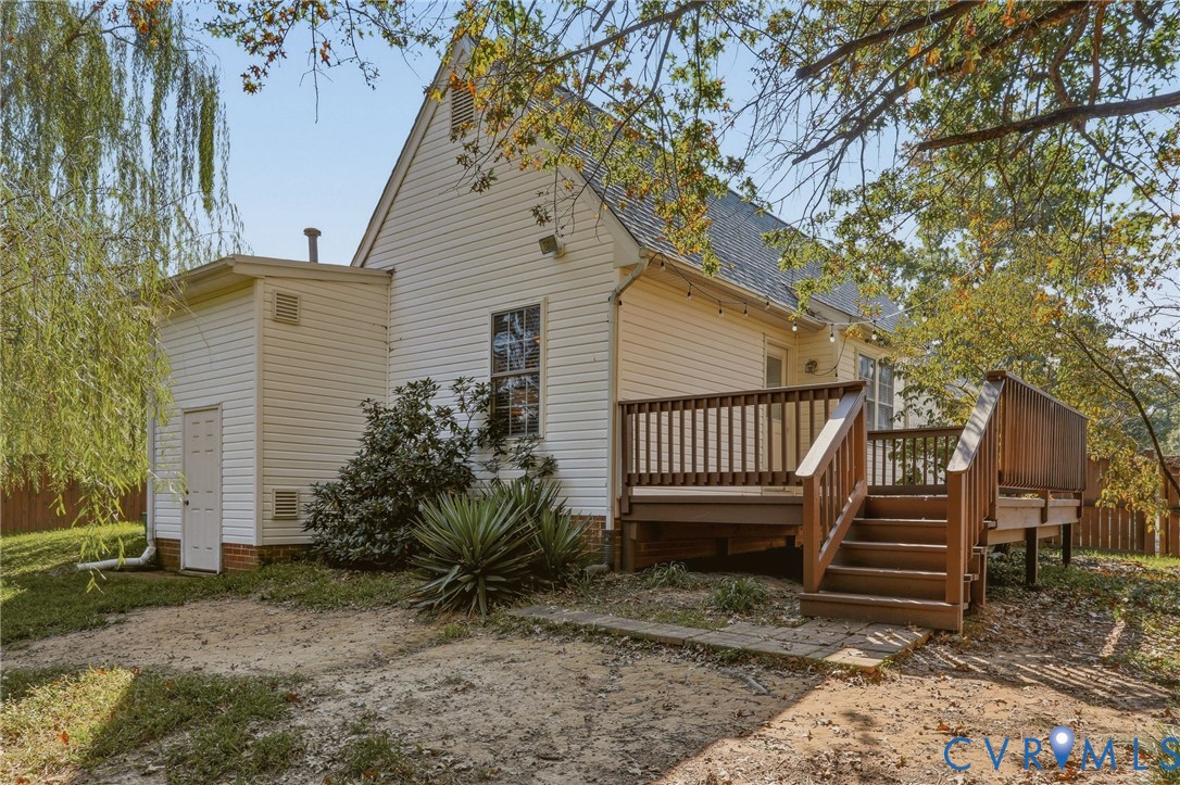 Wood-finish elevated deck with stairs and railing