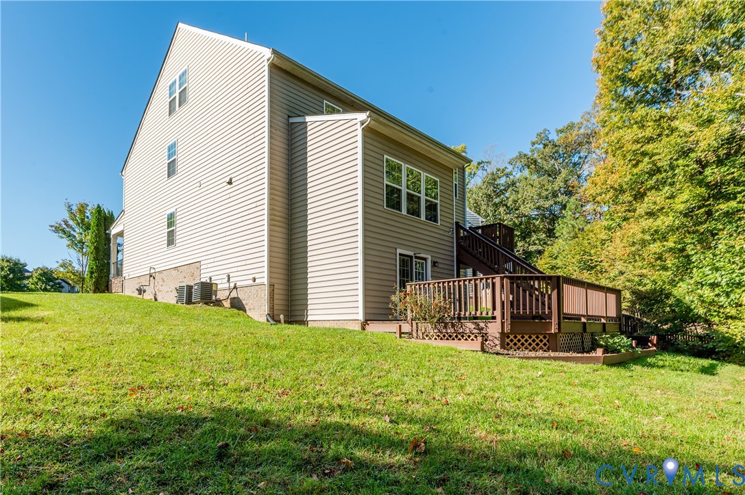 Right Side View of Home with Tree Lined Rear Yard