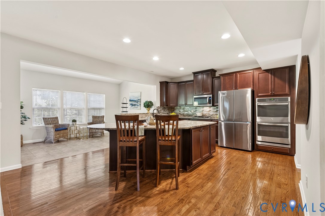 Stainless Steel Appliances with a Four Door Fridge / Freezer Combo elevate your "Play Space!"