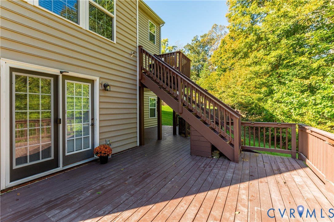 Lower Level - Walk Out Basement Deck connects to Lower Level All Purpose Room