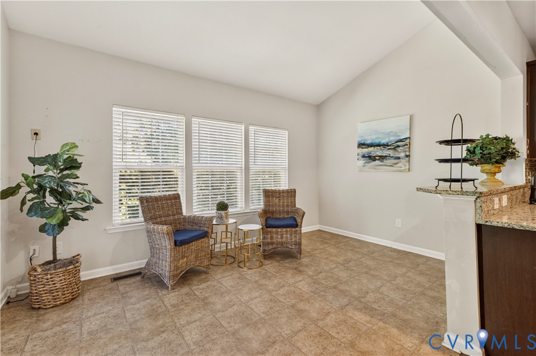 Gathering Room with Ceramic Tiled Floors opens to Upper Deck