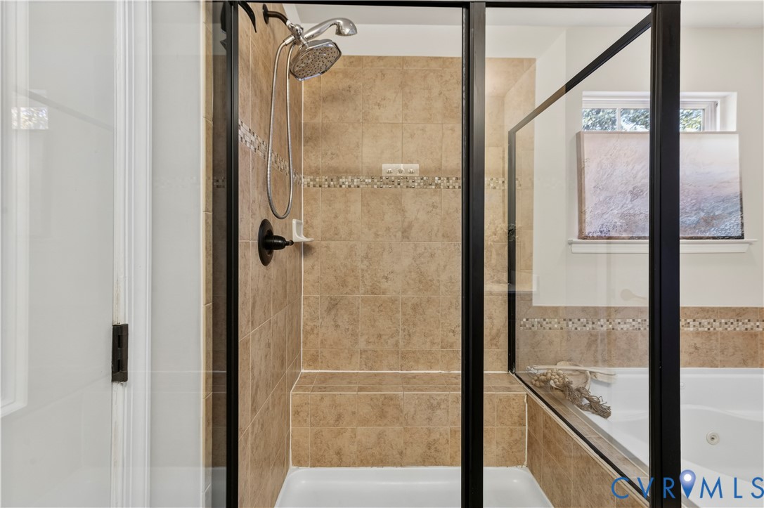 Tiled Shower and Bench with Dual Shower Heads