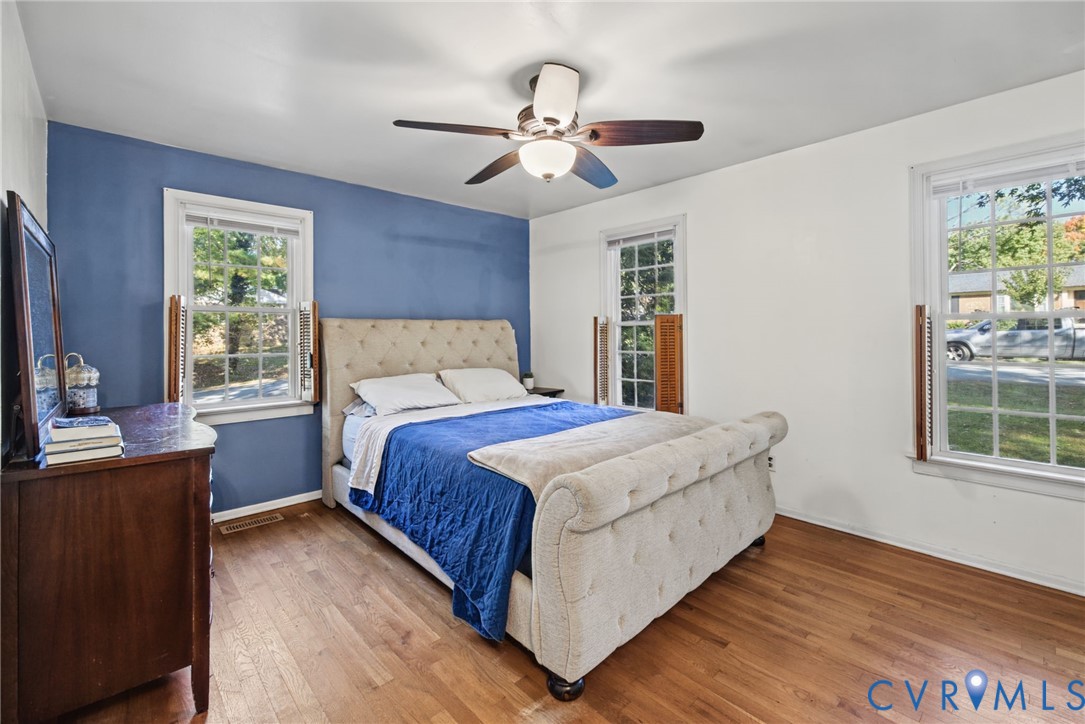 Beautiful hardwoods, ceiling fan with light and closet