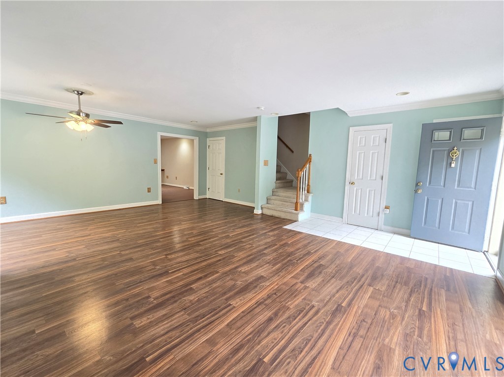 Heading upstairs! (door to half bath next to stairs.