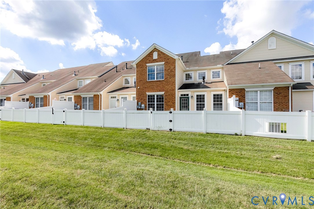 Brick and siding exterior with multiple windows