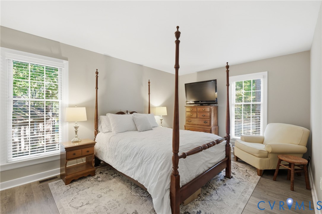 Spacious first-floor primary bedroom designed for convenience