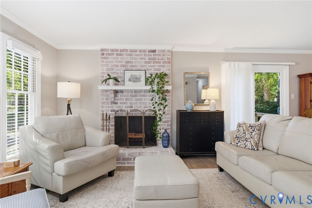 Comfortable living room designed for cozy evenings by the wood-burning fireplace
