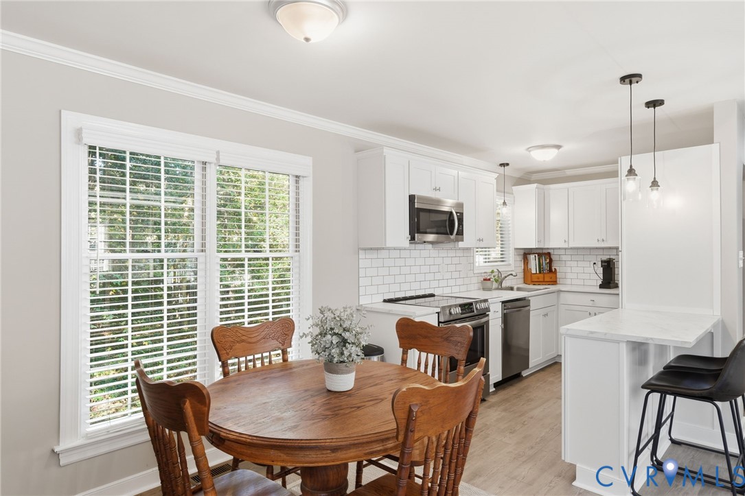 Bright dining space connects you to the kitchen
