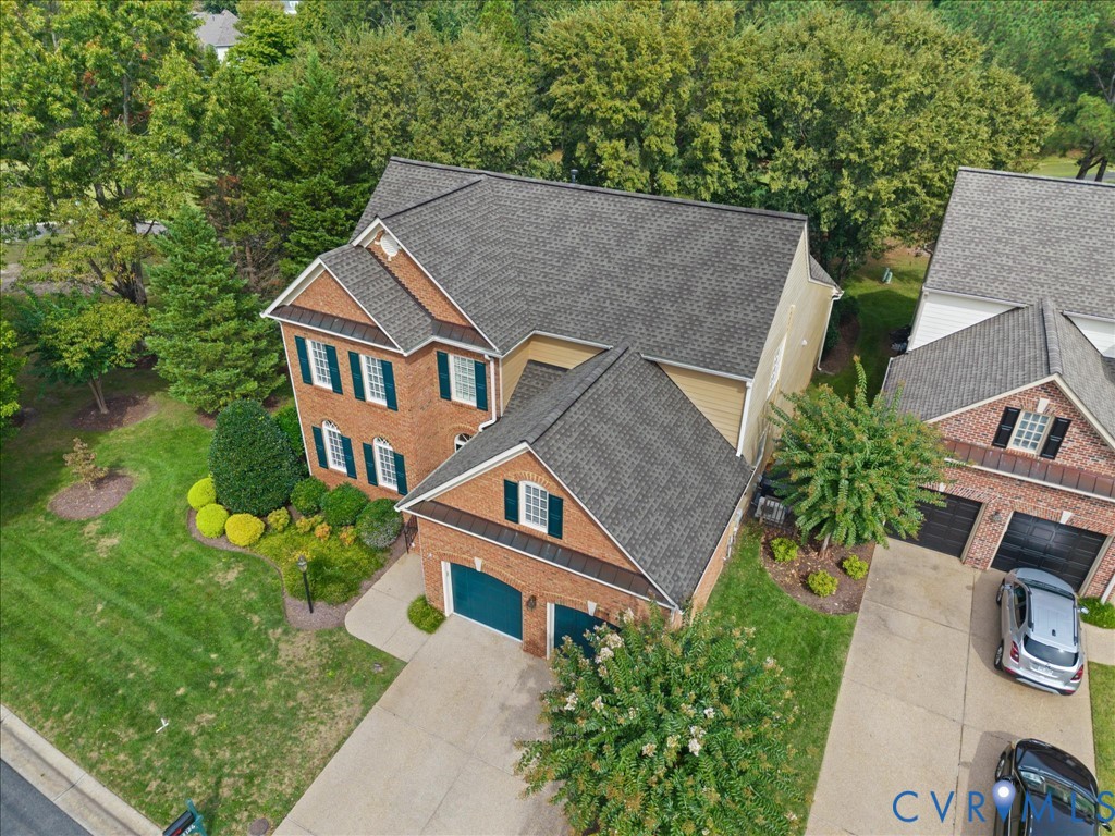 Brick exterior with a two-car garage