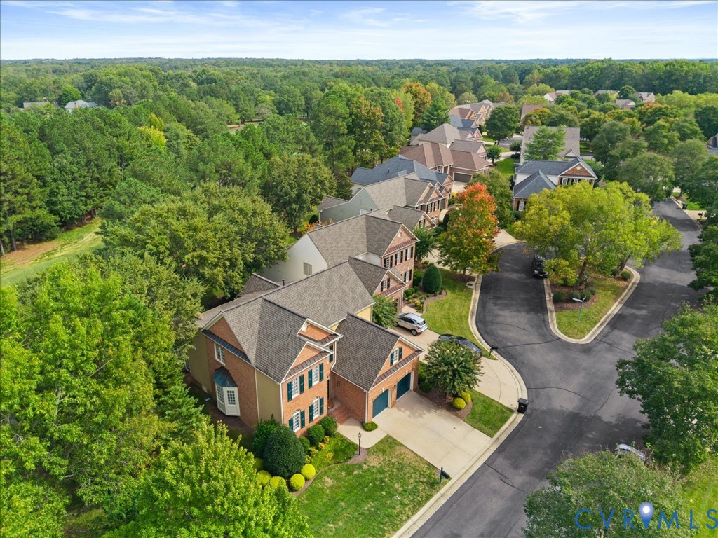 Brick and siding exterior with a two-car garage