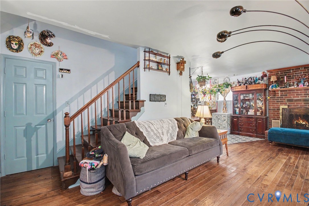 family room showing stairs going to second level