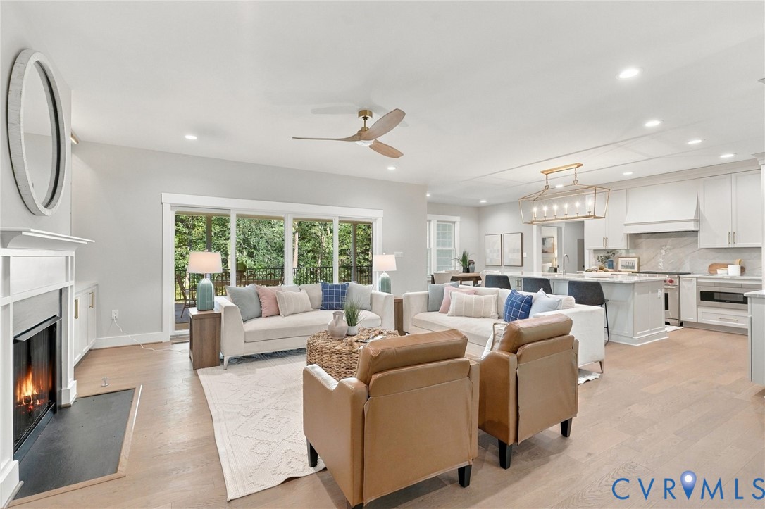 Great Room w/ Cozy Fire and a Glimpse of the Covered Porch