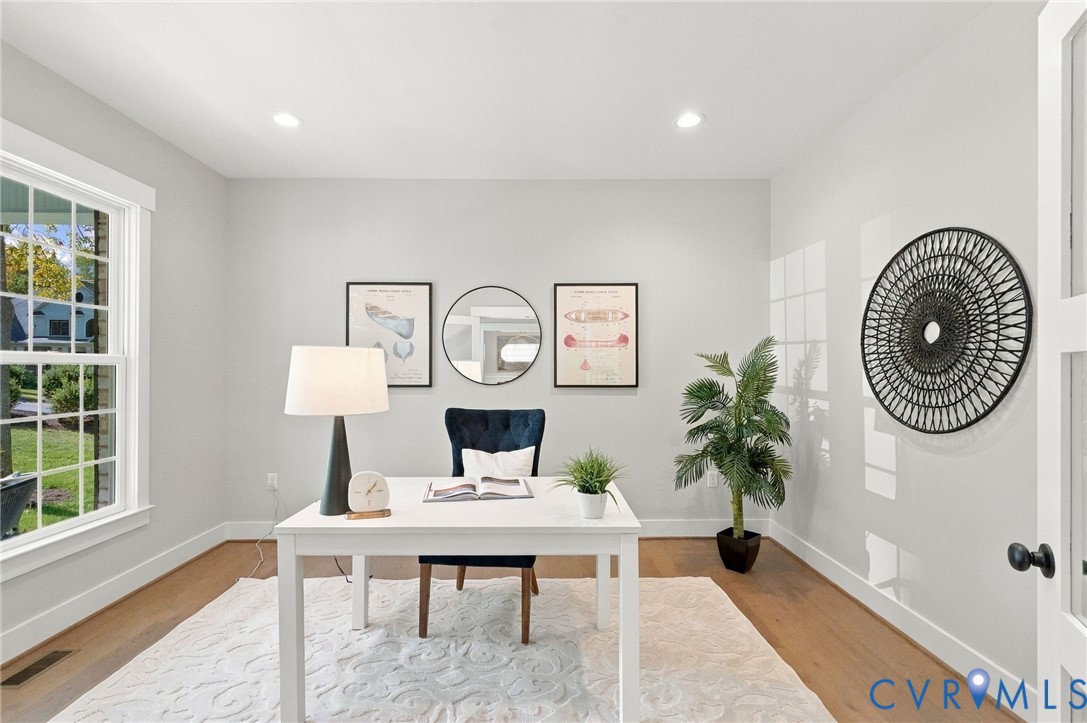 Home Office has Large Windows Providing Natural Light