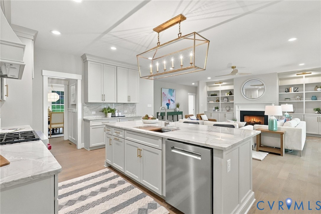 Appliances Include a Wolf Range, Bosch Dishwasher & Sharp Drawer Microwave