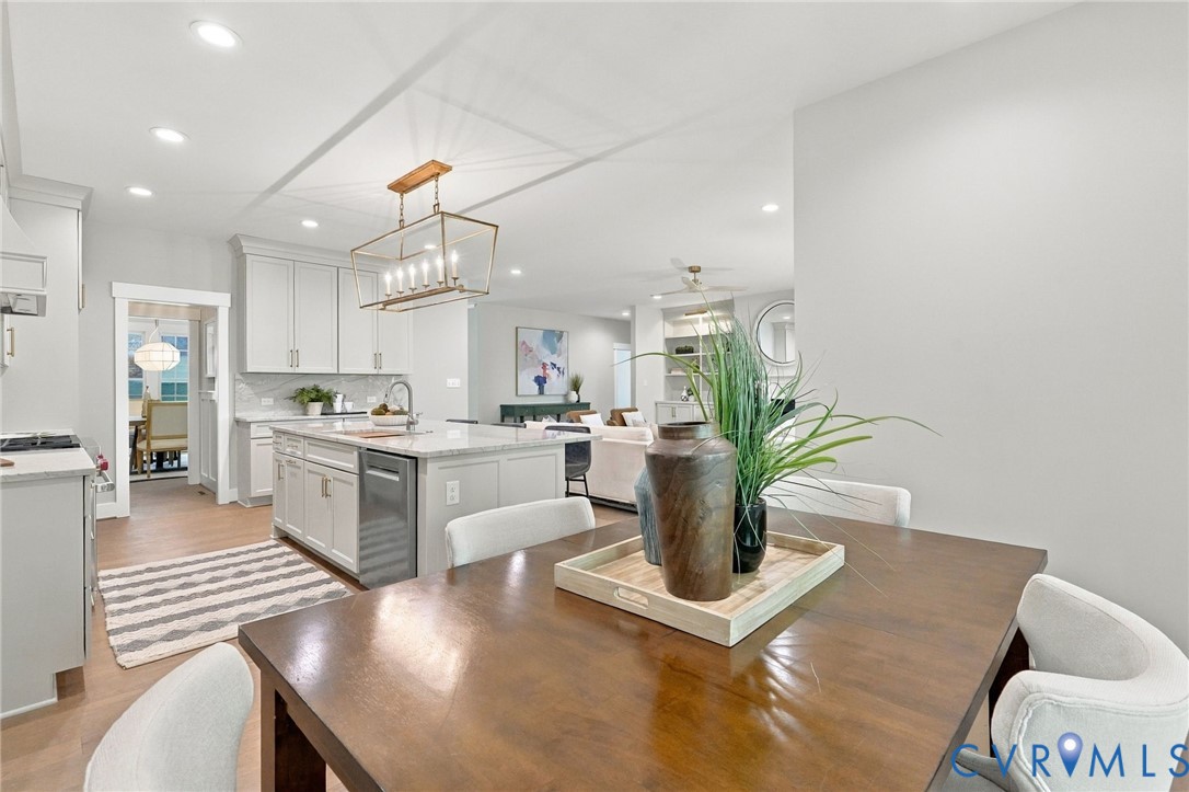 The Kitchen & Breakfast Area have Recessed Lights and Hardwood Floors