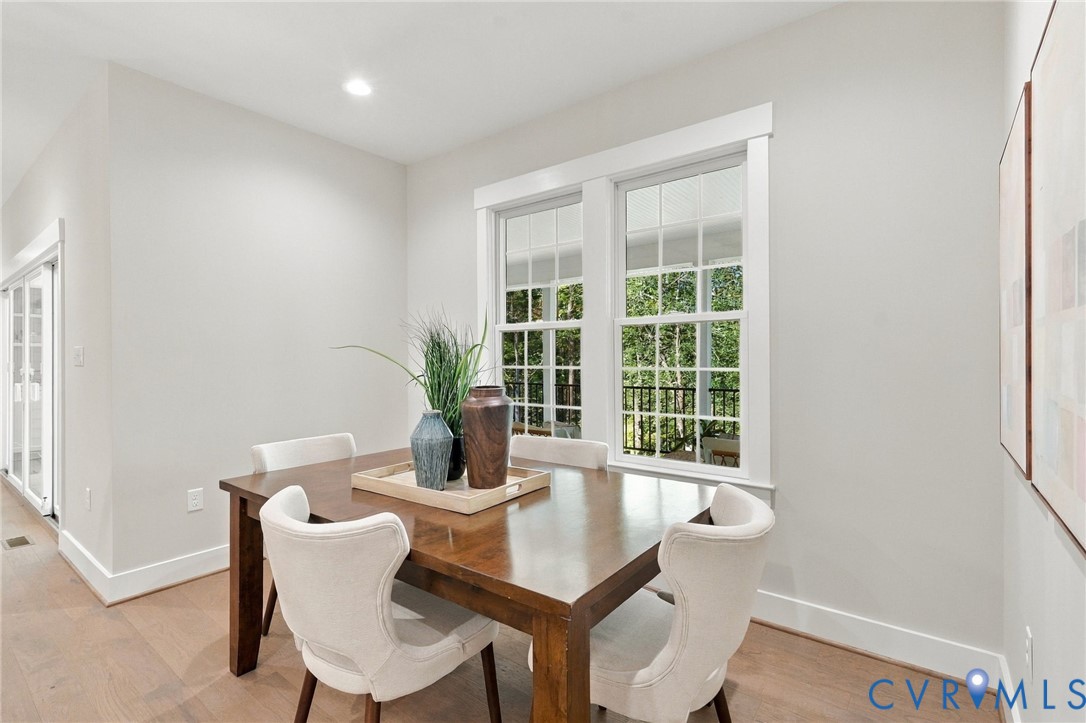 Breakfast Nook has Large Windows Overlooking the Covered Porch & Rear Yard