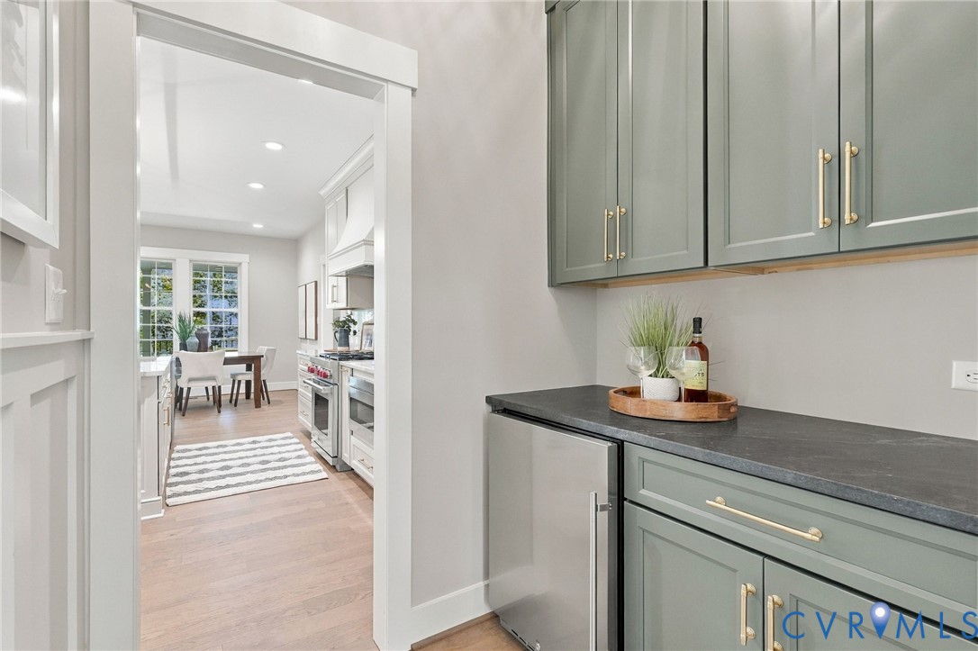 The Butler's Pantry has Stunning Cabinets & Honed Granite Tops