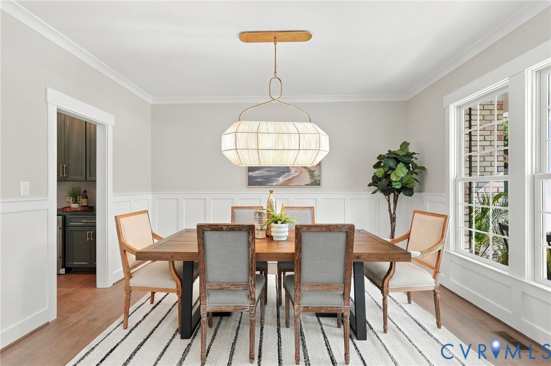 The Formal Dining Room Features a Fabulous Light Fixture from the Visual Comfort Catalog