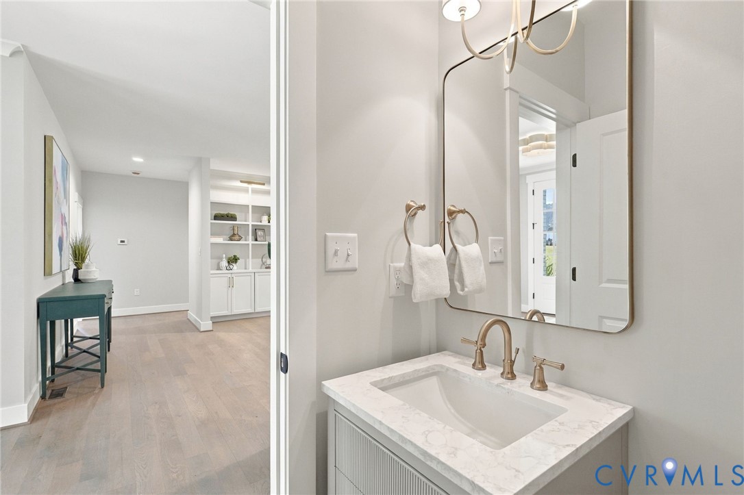 Powder Room is Conveniently Located Out of the Way!
