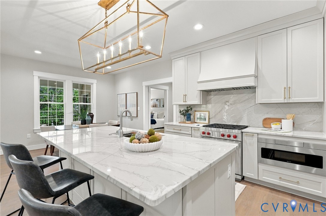 Gorgeous Kitchen Features Graphite Tops & Splash, Wolf Range & Other High End Appliances