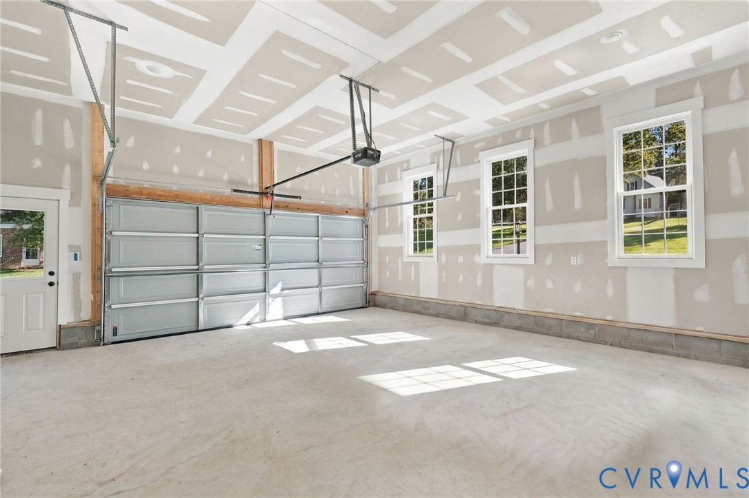 2-Car Garage Includes Pedestrian Door, Utility Sink, and Automatic Garage Door Opener