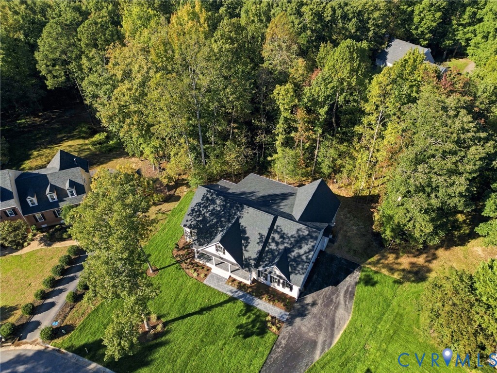 Mature Trees and New Landscaping Add to the Home's Beauty