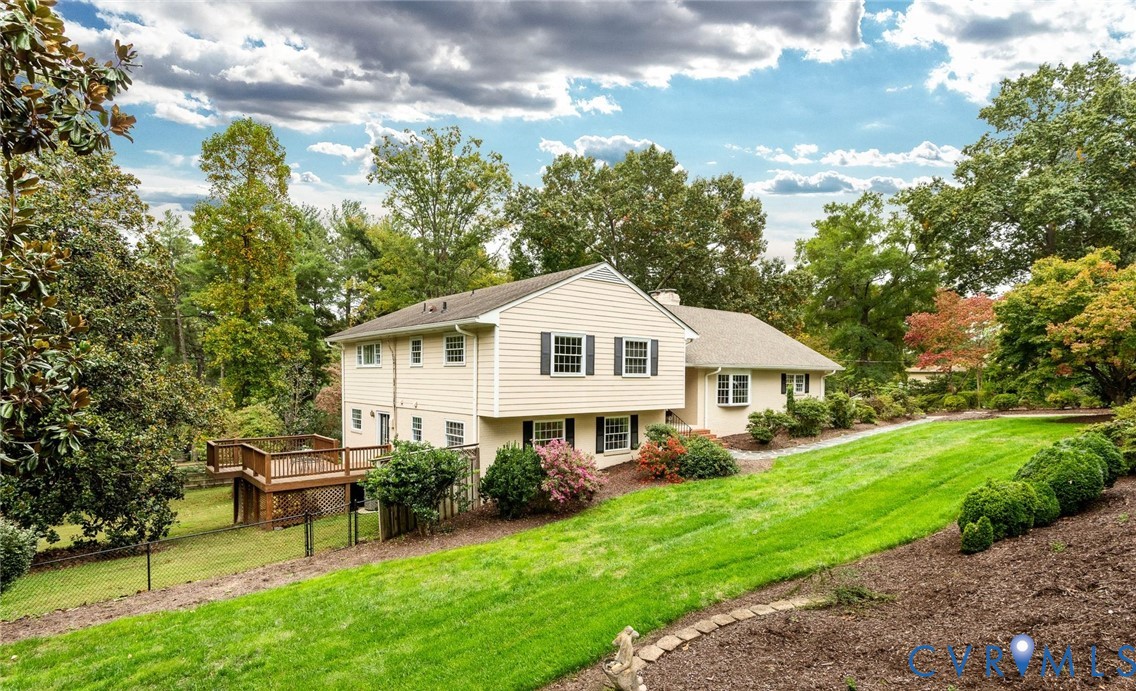 Custom brick quad-level in the charming Sleepy Hollow neighborhood.