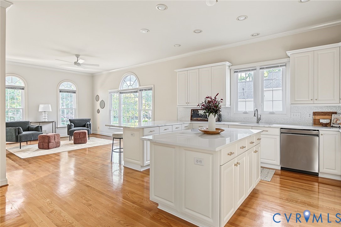 The kitchen and sunny breakfast room invite family to linger.
