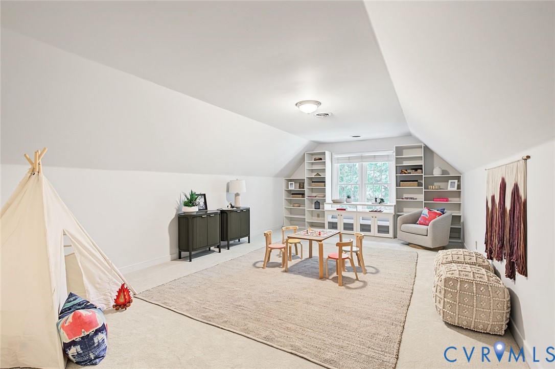 The playroom/media lounge will be the family's favorite room to send kids off to play.