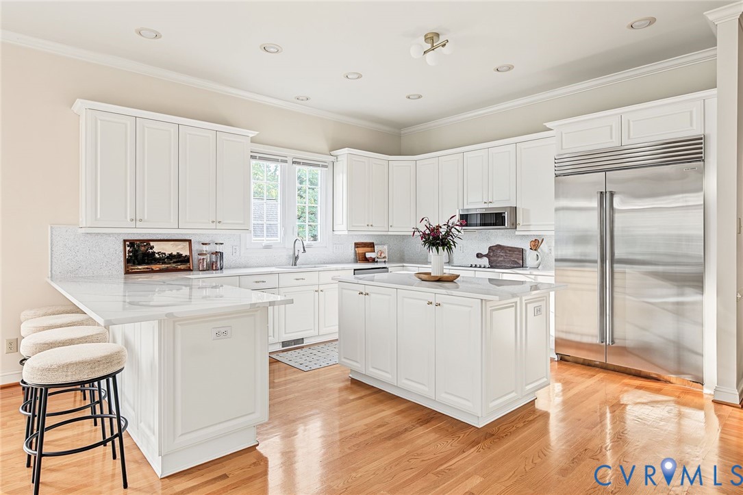 The professional kitchen renovation is sure to dazzle the home chef!