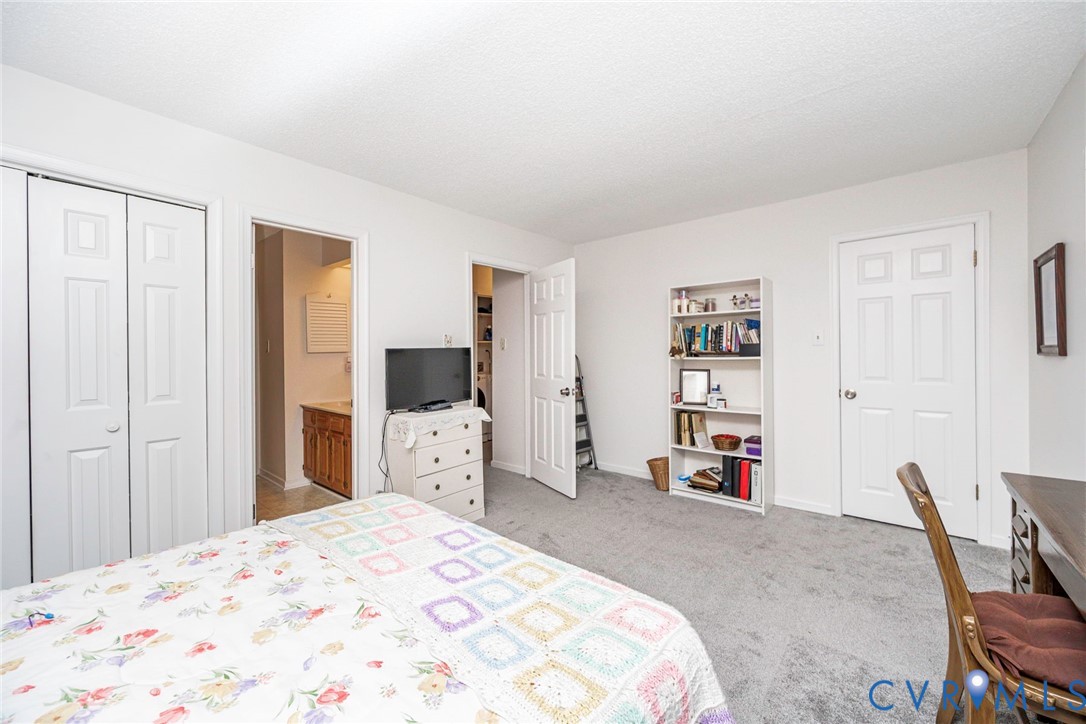 Second large bedroom with two closets and plenty of space for desk or seating area.