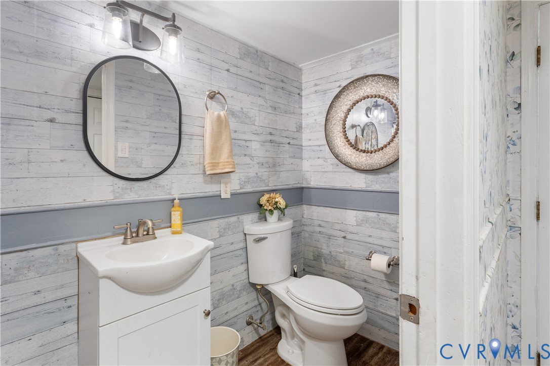 This full Bathroom is right off the garage entry! Easy shower after working in the garage or playing in the yard!