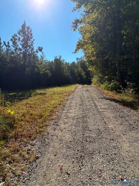 Driveway access to the potential driveway of listed property.