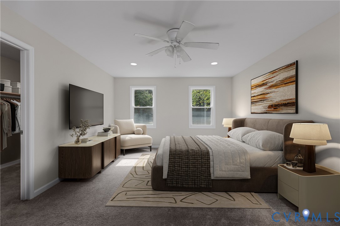 Bedroom featuring wall-to-wall carpeting, a white ceiling fan with integrated lighting, recessed lighting, and dual windows
