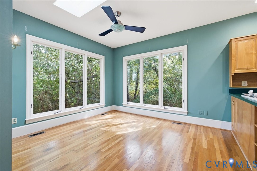The Kitchen is alight with windows creating a treehouse feel.