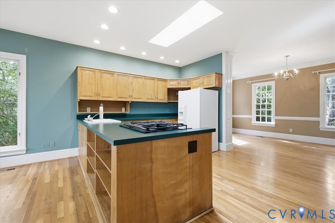 The Kitchen flows right into the extra large Formal Dining Room.