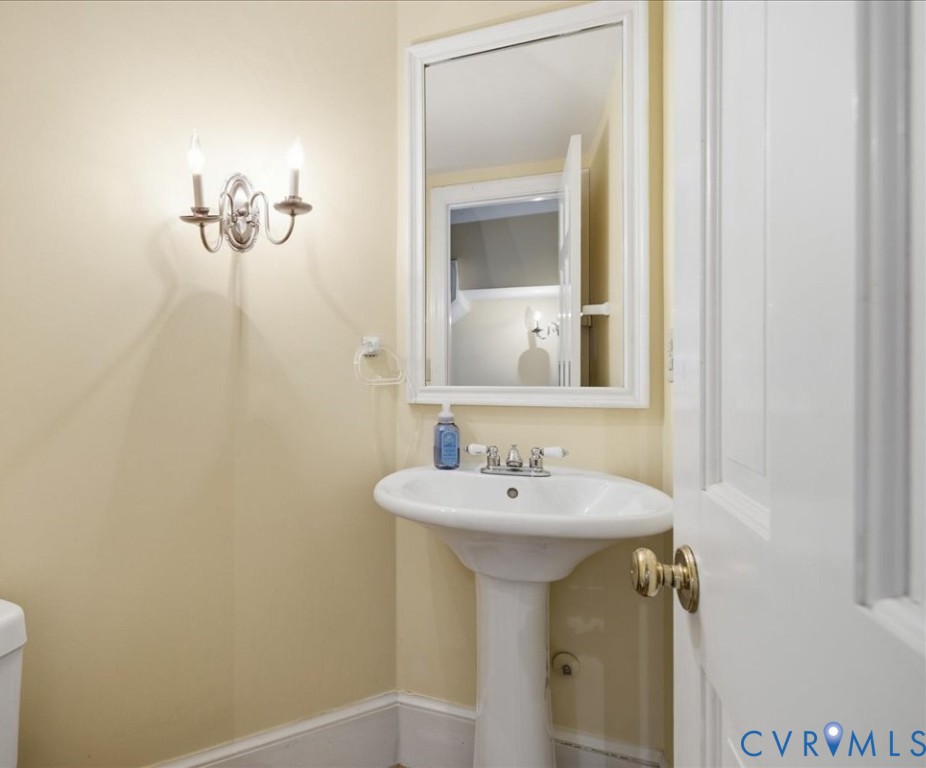 Powder Room ( Half Bath)  opens from the Entry Hall.