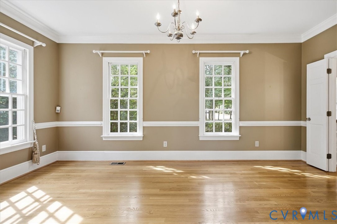 Amazing woodwork and wood floring in the Formal Dining Room.