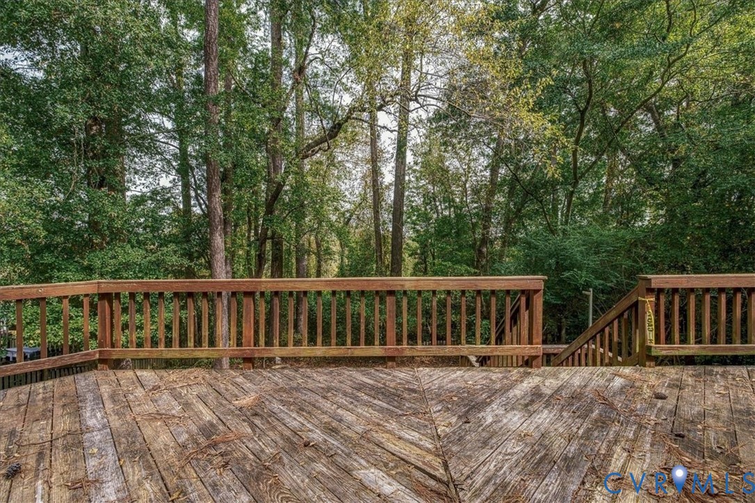 Over sized deck across the rear of this home.