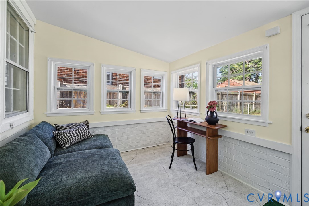 Windows on 3 sides with door directly to the rear yard.