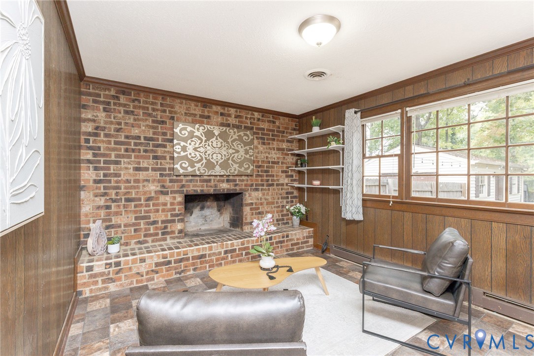 1st floor- access to rear yard- brick fireplace