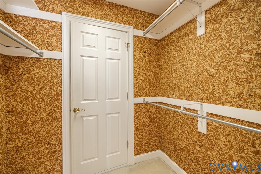 Closet in 3rd bedroom that leads to spacious attic/storage