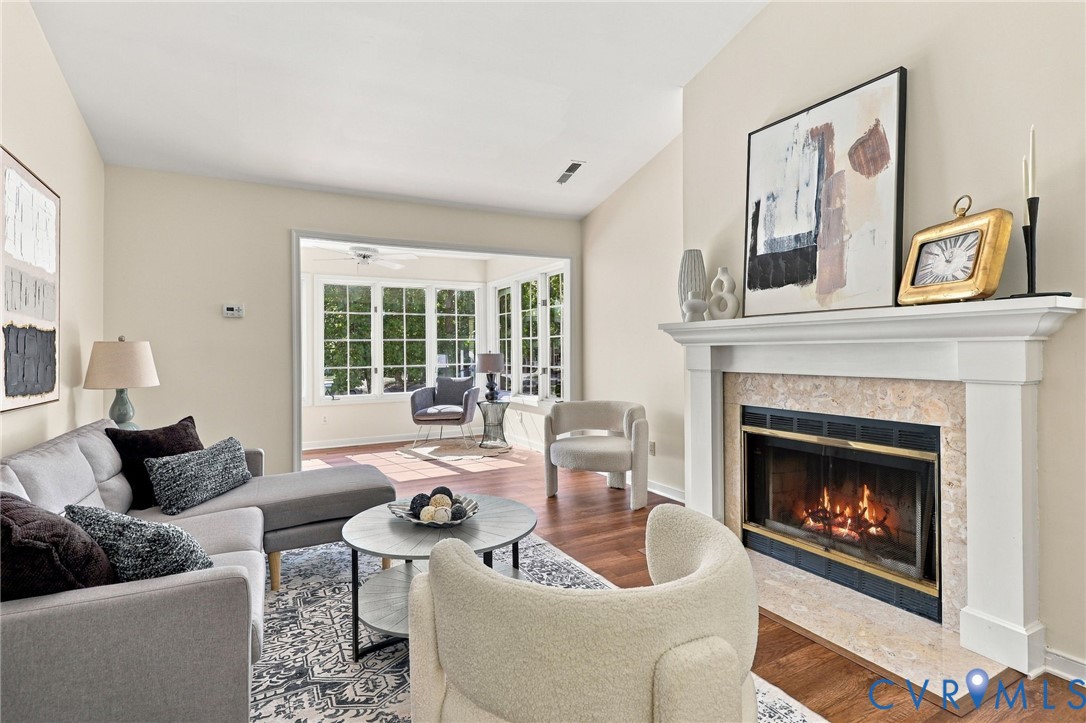 Opens to lovely sun room Opens to lovely sun room