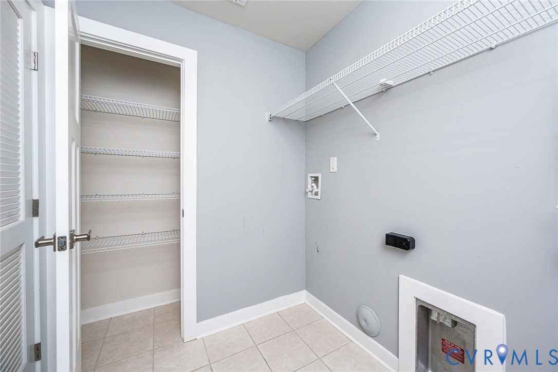 Laundry Room with Linen Closet & Shelving