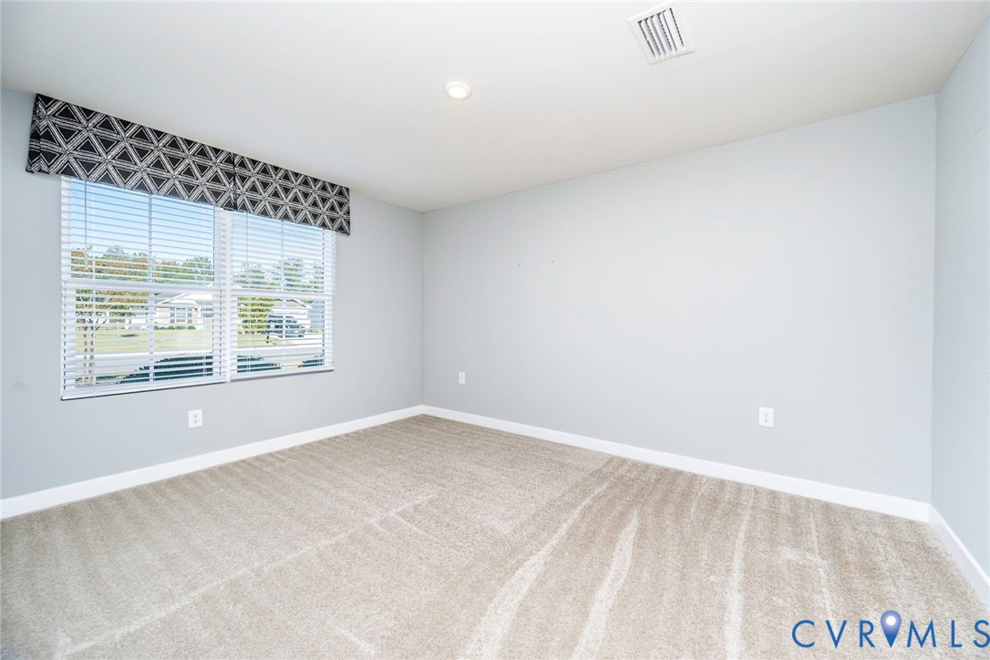 Bedroom 3 with Carpet & Recessed Light
