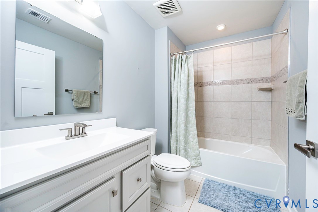 Hall Bathroom with tile floors and tub surround Hall Bathroom with tile floors and tub surround