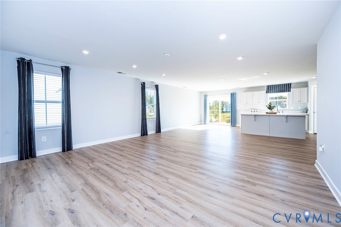 Family Room with Open Concept to Kitchen and Dining Area