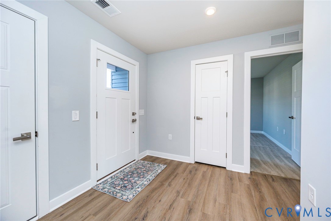 Foyer Area with Coat Closet & Recessed Lighting Foyer Area with Coat Closet & Recessed Lighting