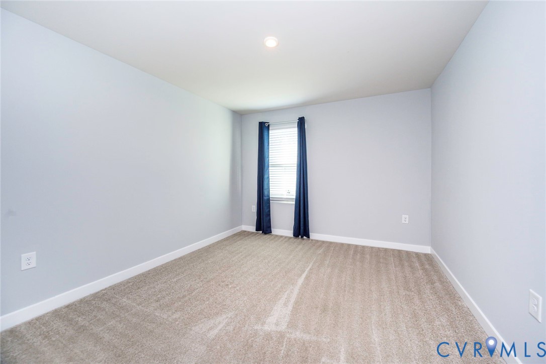 Bedroom 2 with carpet and recessed ceiling light Bedroom 2 with carpet and recessed ceiling light