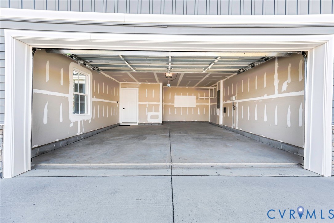 Two-car garage with extra storage area
